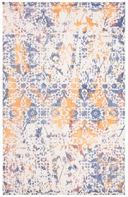 Ivory and Navy Round Tufted Viscose Area Rug