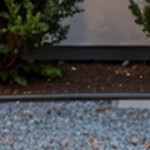 brown wicker/beige cushion