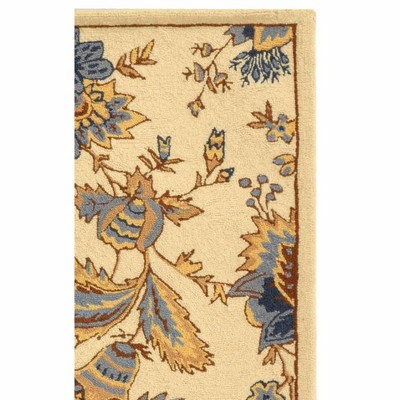 Ivory Floral Wool Hand-Hooked Rectangular Area Rug