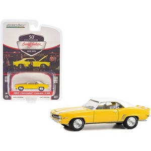 1969 Chevrolet Camaro Z/28 Daytona Yellow with White Stripes, Top, and Interior (Lot #1043) 1/64 Diecast Model Car by Greenlight - 1 of 3