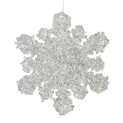 Vickerman 5" Clear Snowflake Silver Glitter. This clear snowflake features a dusting of silver glitter. Includes 6 pieces per bag.
