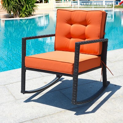 Black Iron Rocking Armchair with Orange Cushions