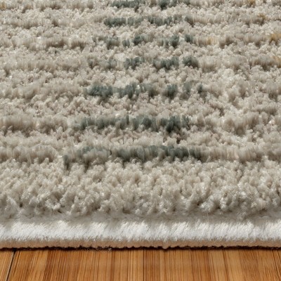 Vania Cream Geometric Tufted Synthetic 5' x 7' Area Rug