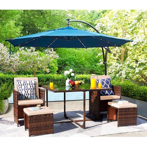 Rattan table chairs online and parasol