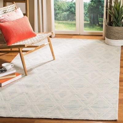 Light Blue and Ivory Geometric Wool 4' x 6' Area Rug