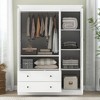 TIRAMISUBEST 3 Shutter Door Wardrobe Closet with 2 Storage Drawers and Hanging Rod, Wooden Armoire Clothes Organizer with Storage Shelves - 2 of 4