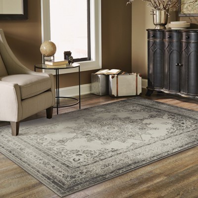 Ivory Rectangular Stain-Resistant Synthetic Area Rug, 6'7" x 9'6"