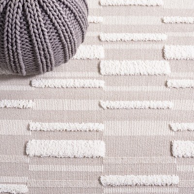 Ivory Geometric 9' x 12' Synthetic Easy Care Area Rug