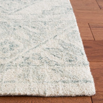 Handmade Light Blue Wool and Synthetic Tufted Rug