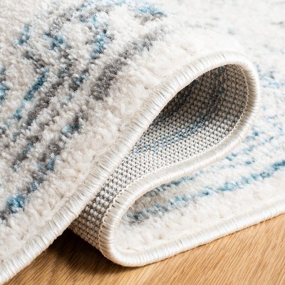 Ivory and Teal Hand-knotted Round Synthetic Area Rug