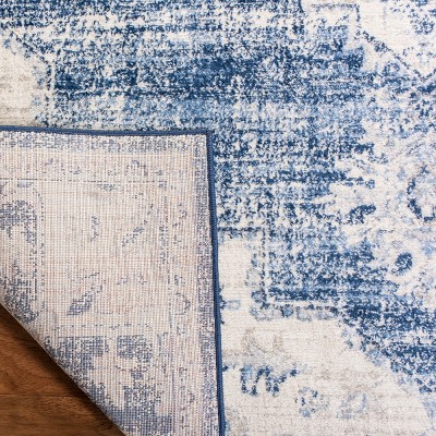 Ivory and Navy Classic Synthetic Round Rug, 6' x 9', Stain-Resistant