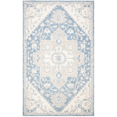 Handmade Blue and Ivory Wool 4' x 6' Tufted Area Rug