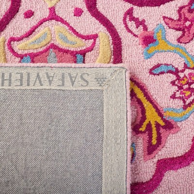 Handmade Tufted Floral Wool Area Rug in Blue - 59" x 96"