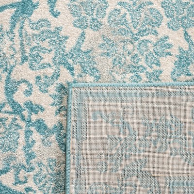 Ivory and Light Blue Hand-knotted Synthetic Area Rug