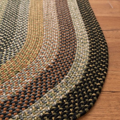 Handmade Blue Oval Braided Synthetic 6' x 9' Rug