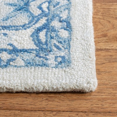 Ivory and Blue Handmade Wool Round Tufted Rug