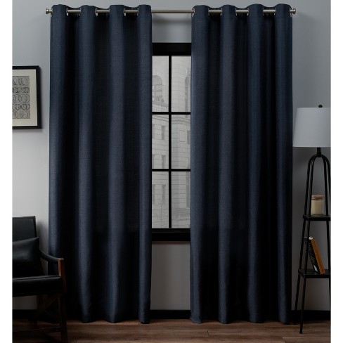 Set of 2 Threshold Light Filtering Curtains Blue 54 X 84 inches Grommet top. 
