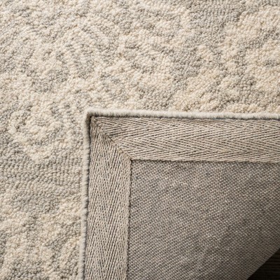 Silver and Ivory Handmade Wool 6' x 9' Tufted Area Rug