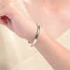 14K Gold-Plated Leaf Cuff Bracelet, showcasing a delicate and nature-inspired design that adds a touch of elegance to any outfit. - 3 of 4