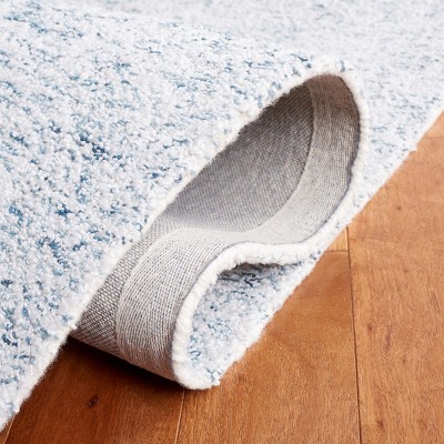 Ebony Light Blue Wool and Synthetic Hand Tufted Area Rug