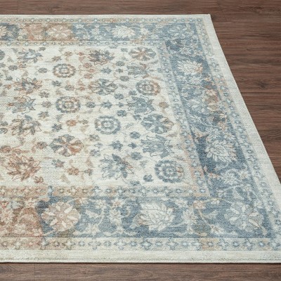 Ivory and Blue Floral Synthetic 8' x 10' Area Rug