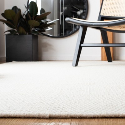 Ivory Hand Tufted Wool Rectangular Area Rug 6' x 9'