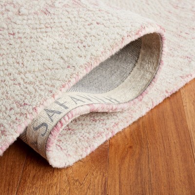 Ebony 5' x 8' Pink and Ivory Hand Tufted Wool Area Rug