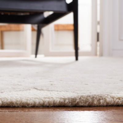 Ivory Hand-Tufted Wool Rectangular 4' x 6' Area Rug