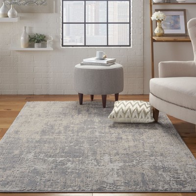 Ivory Abstract Power-Loomed Synthetic 5'3" x 7'3" Area Rug
