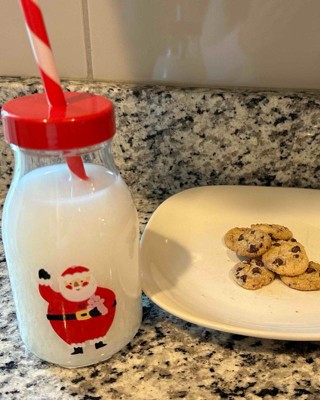 Christmas Milk For Santa In Bottle With Straw And Peppermint Candy