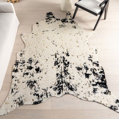 Black and White Tufted Synthetic Cowhide Accent Rug
