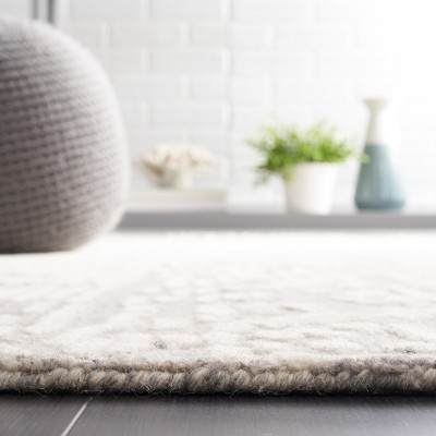 Gray and Ivory Handmade Wool Tufted 8' x 10' Area Rug