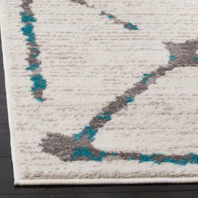 Ivory and Blue Medallion Hand-Knotted Synthetic Rug, 4' x 6'