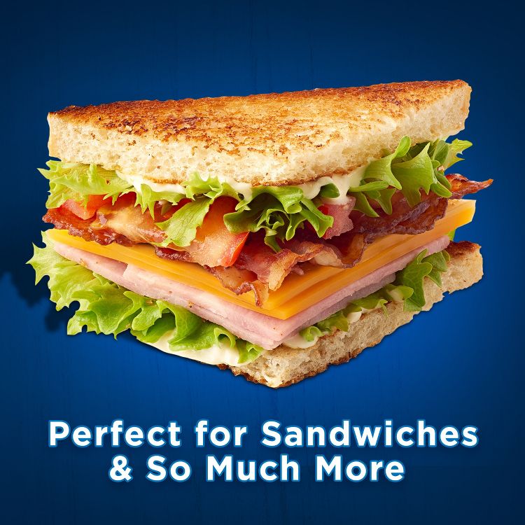 A sandwich with layers of lettuce, bacon, cheese, ham, and mayonnaise between toasted bread slices, with the text "Perfect for Sandwiches & So Much More" below.