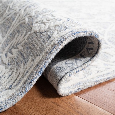 Blue and Ivory Hand-Tufted Wool 4' x 6' Area Rug