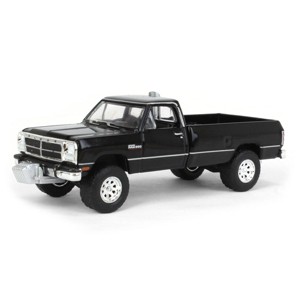 Greenlight Collectibles 1/64 1992 Dodge Ram 1st Generation Black Pulling Truck Outback Toys Exclusive 51386-A - 1 of 4