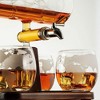 The Wine Savant Ship Design Wine & Whiskey Decanter Set Includes 4 Globe Drinking Glasses laid on a Mahogany wooden platter, Home Bar Decor - 1000 ml - 3 of 4