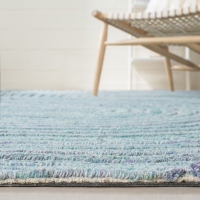 Handmade Blue Wool and Synthetic Tufted 8' x 10' Area Rug