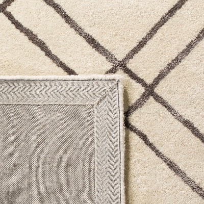 Hand-Tufted Artisan Square Wool Rug in Rich Brown