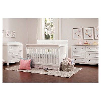 baby cradle attached to bed