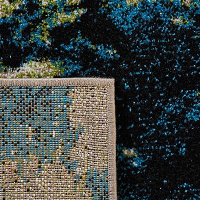Navy and Green Abstract 4' x 6' Synthetic Area Rug