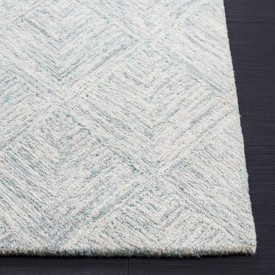 Grey and Turquoise Abstract Tufted Wool 4' x 6' Rug