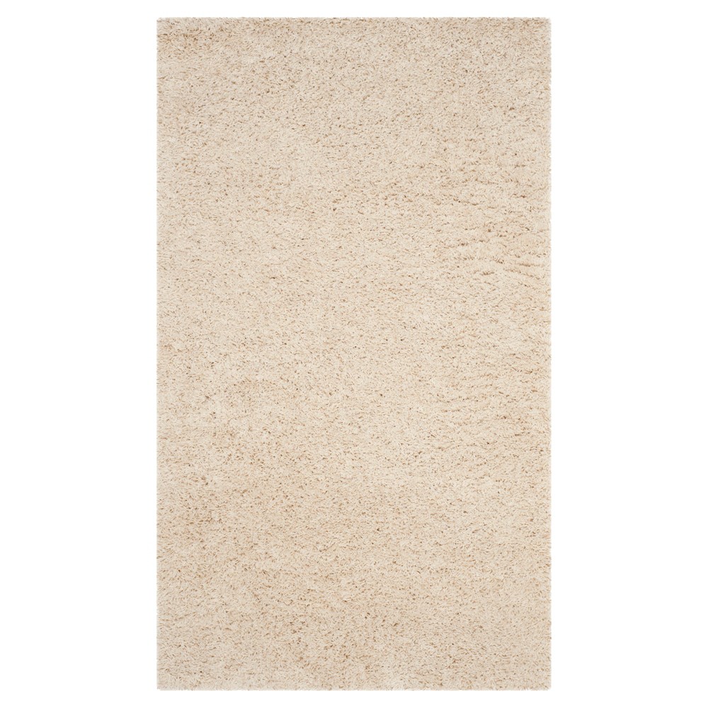 3'x5' Rayan Solid Loomed Accent Rug Beige - Safavieh