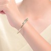 14K Gold-Plated Bypass Cuff Bracelet, featuring a sleek and modern design with a stylish crossover detail for a sophisticated and versatile look. - 2 of 3