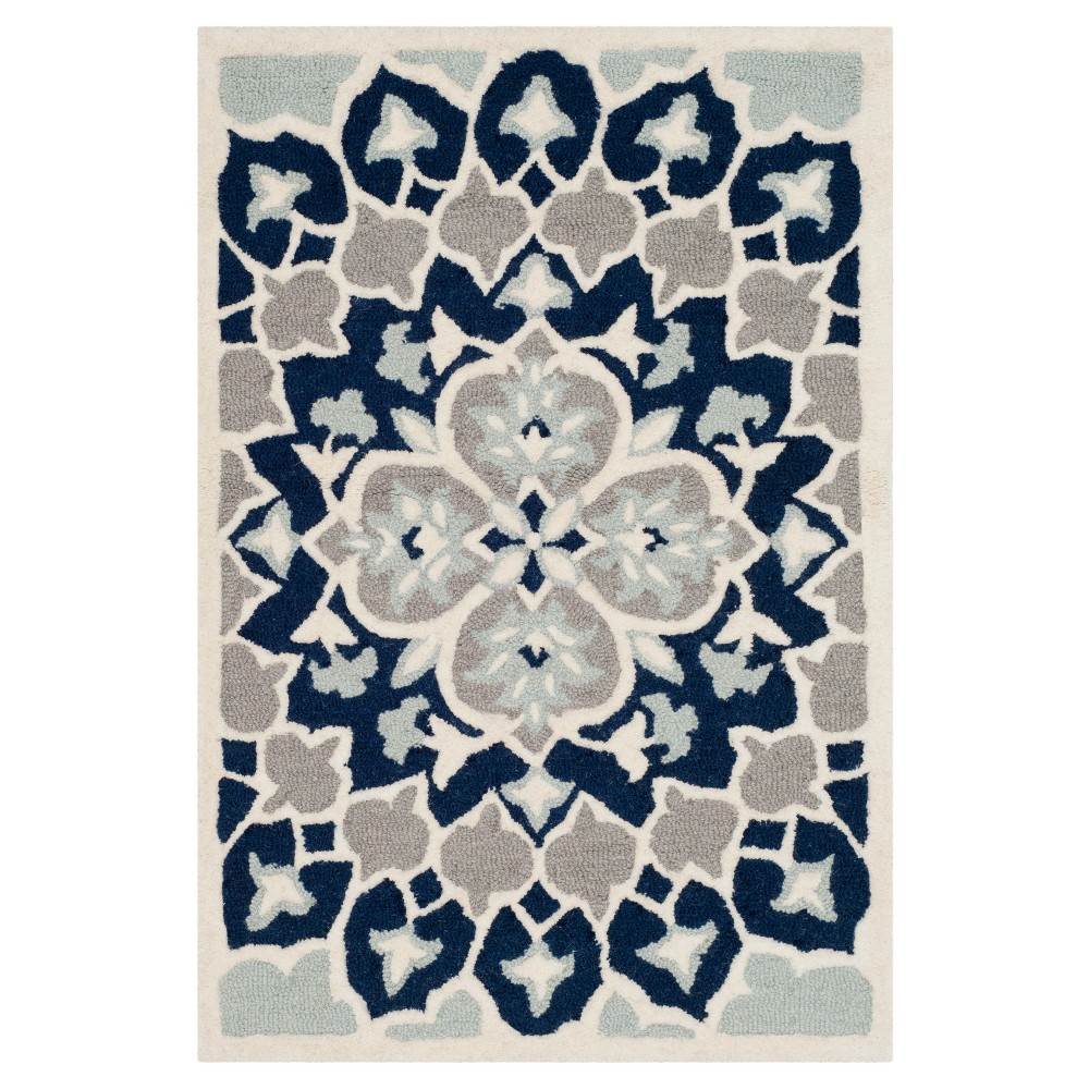 Navy Blue/Ivory Medallion Tufted Accent Rug 2'x3' - Safavieh