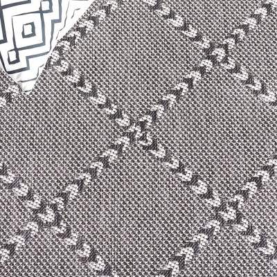 Percival Black and Ivory Geometric 8' x 10' Synthetic Area Rug
