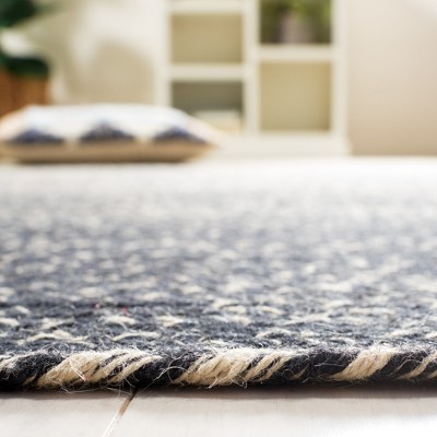 Handmade Natural and Black Jute Area Rug, 6' x 9'