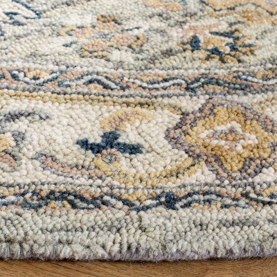 Ivory Round Hand-Tufted Wool Area Rug