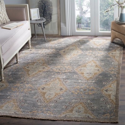 Handmade Brown Wool 6' x 9' Floral Area Rug