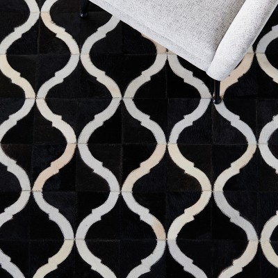 Hand-Knotted Black and Beige Geometric Cowhide Rug